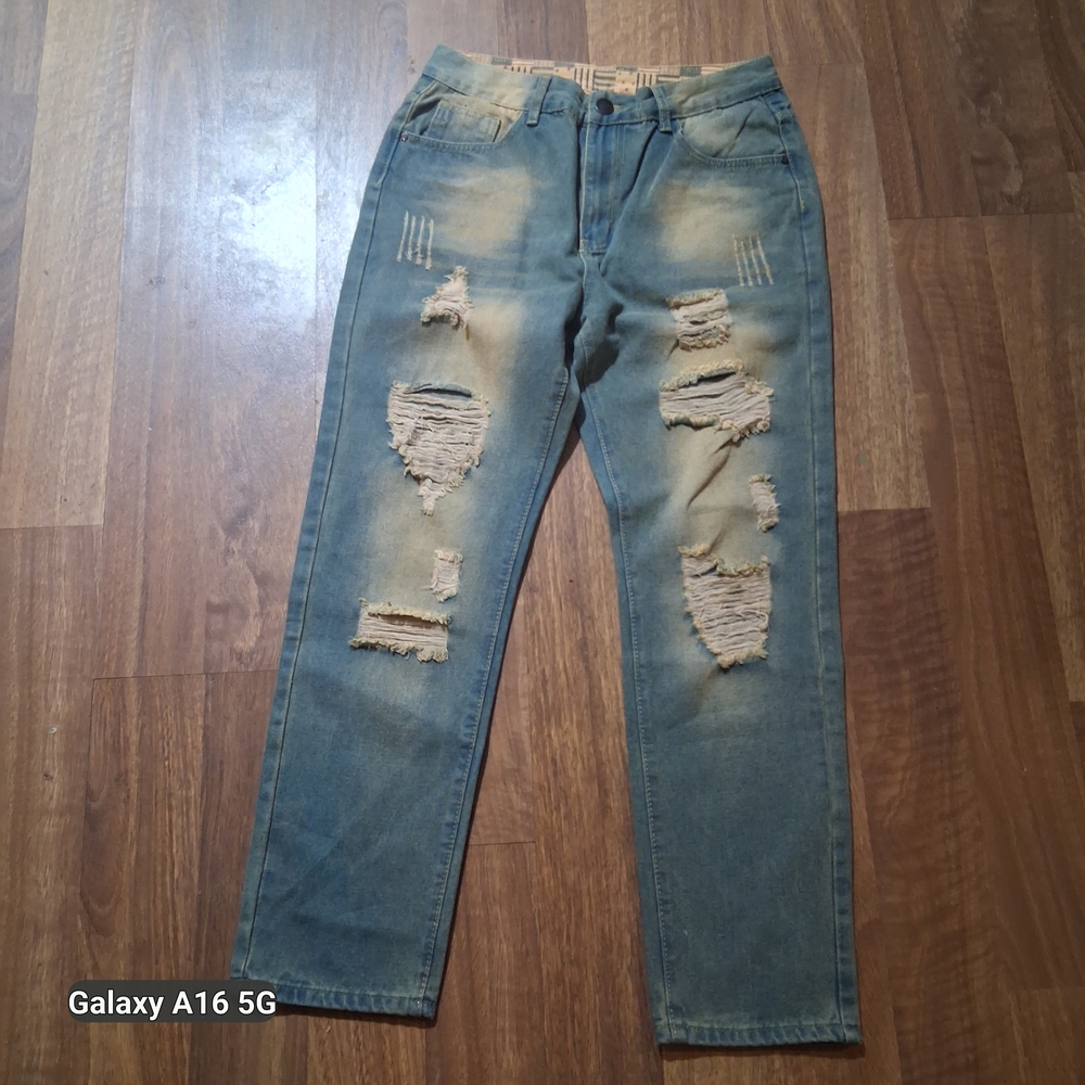 Distressed Light Blue Denim Jeans